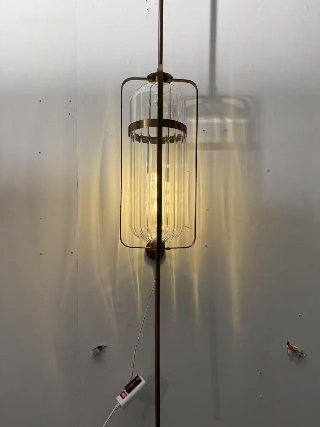 Ribbed-glass wall light during workshop testing