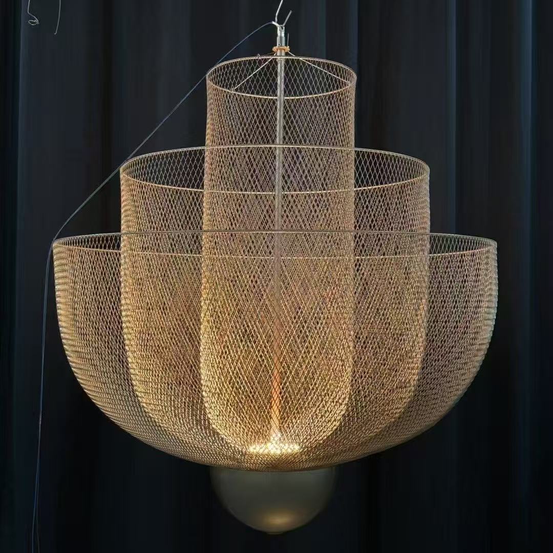 Woven-metal chandelier during workshop testing