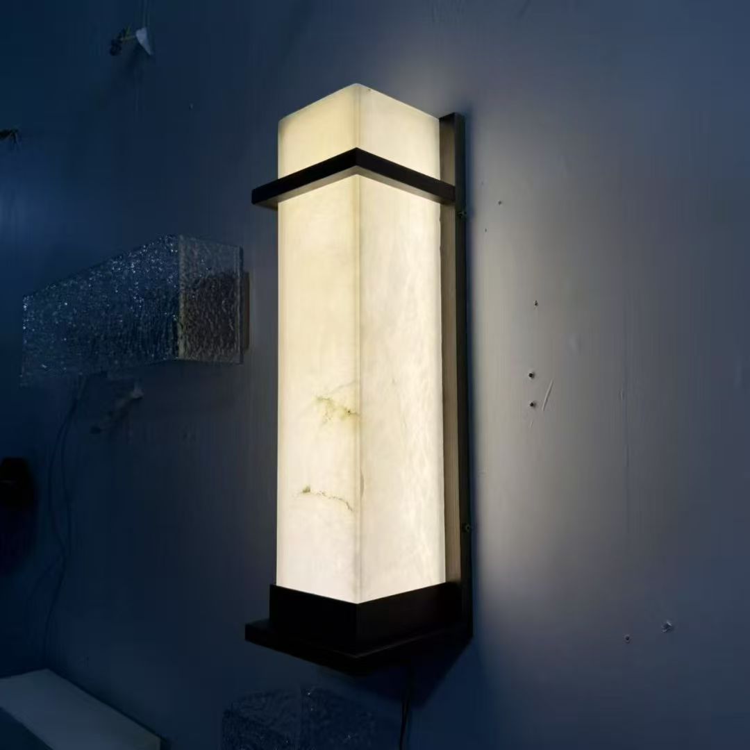 Rectangular illuminated wall light photographed in the workshop