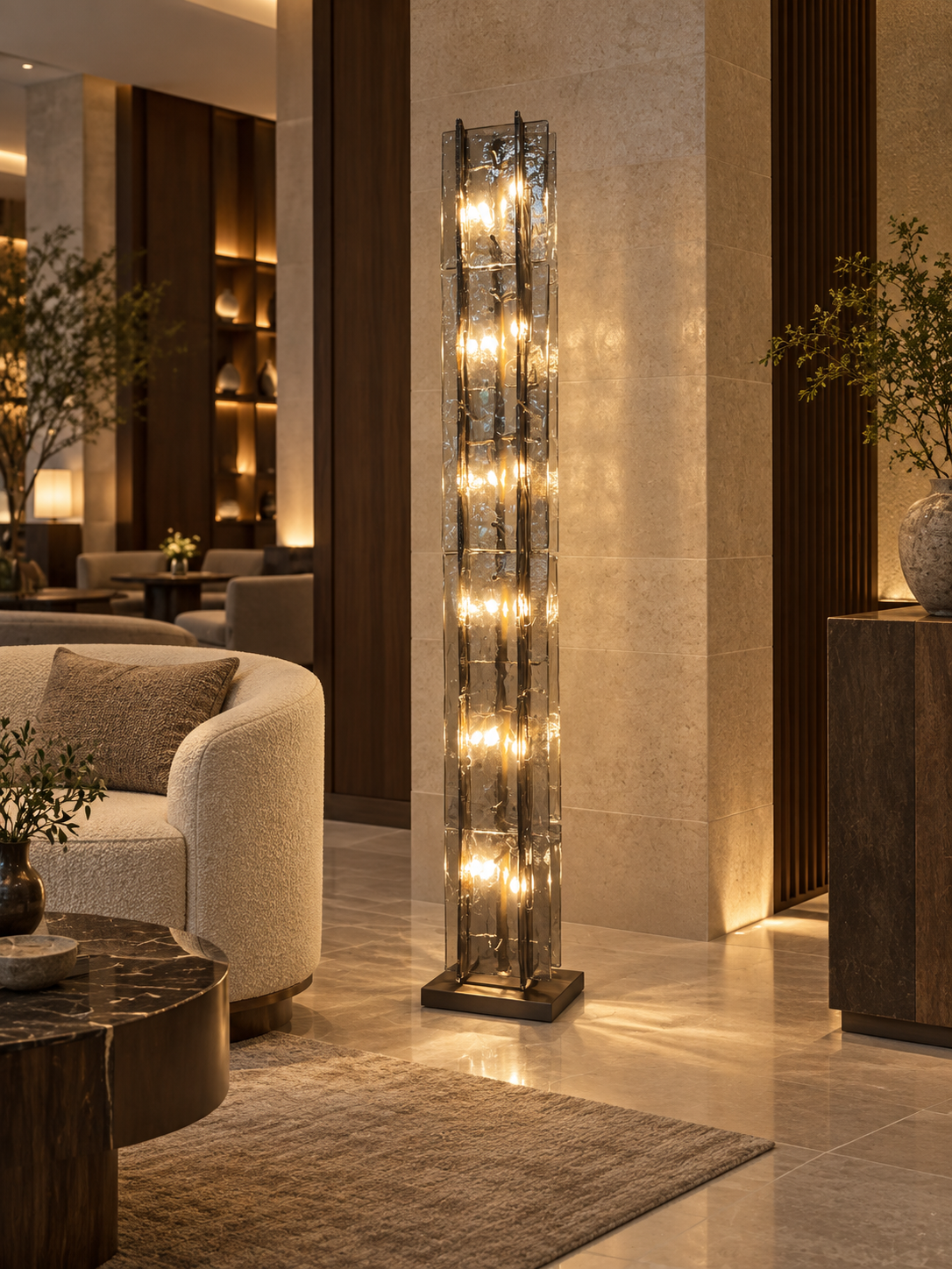 Tall textured glass floor lamp in a hospitality lounge