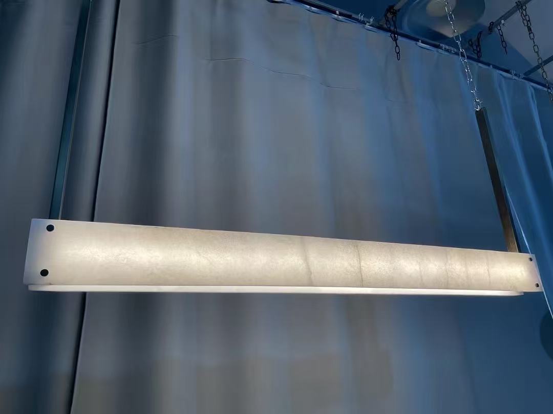 Minimal stone-effect linear pendant suspended for testing