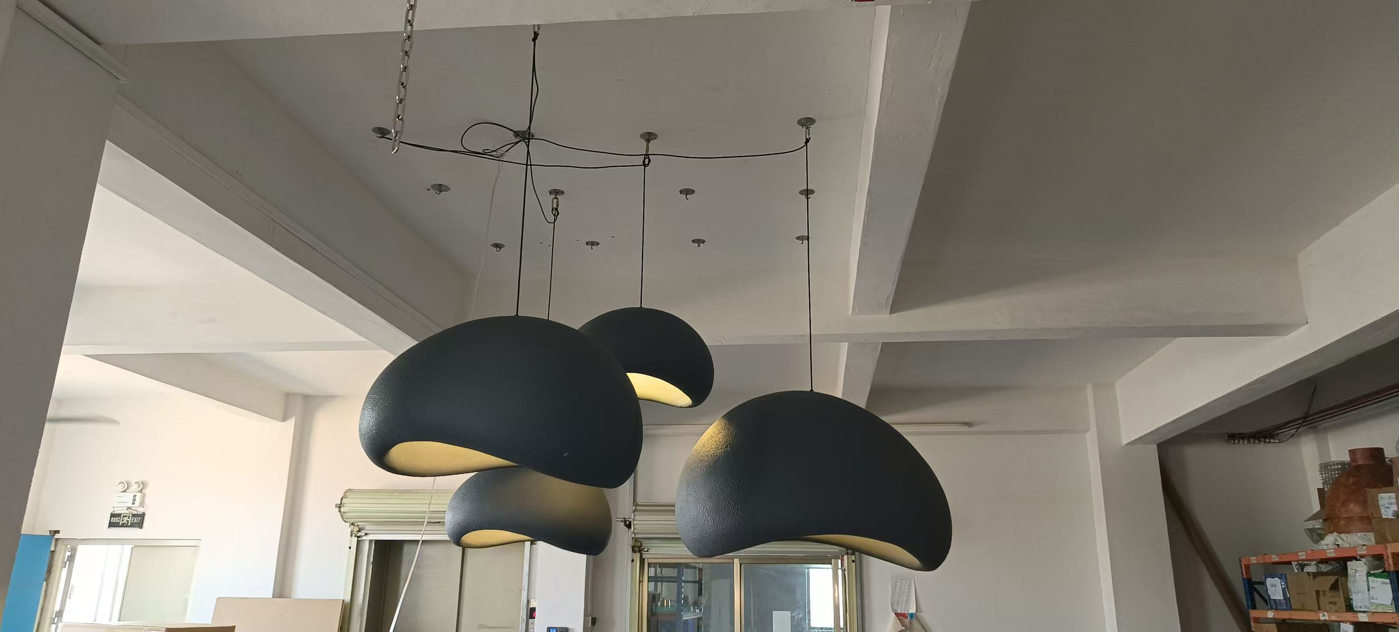Sculptural dome pendant photographed in the workshop