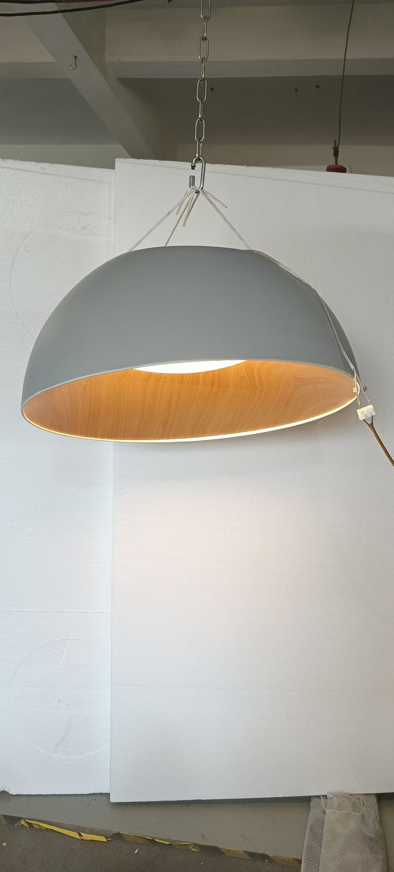 Wide dome pendant photographed in the workshop