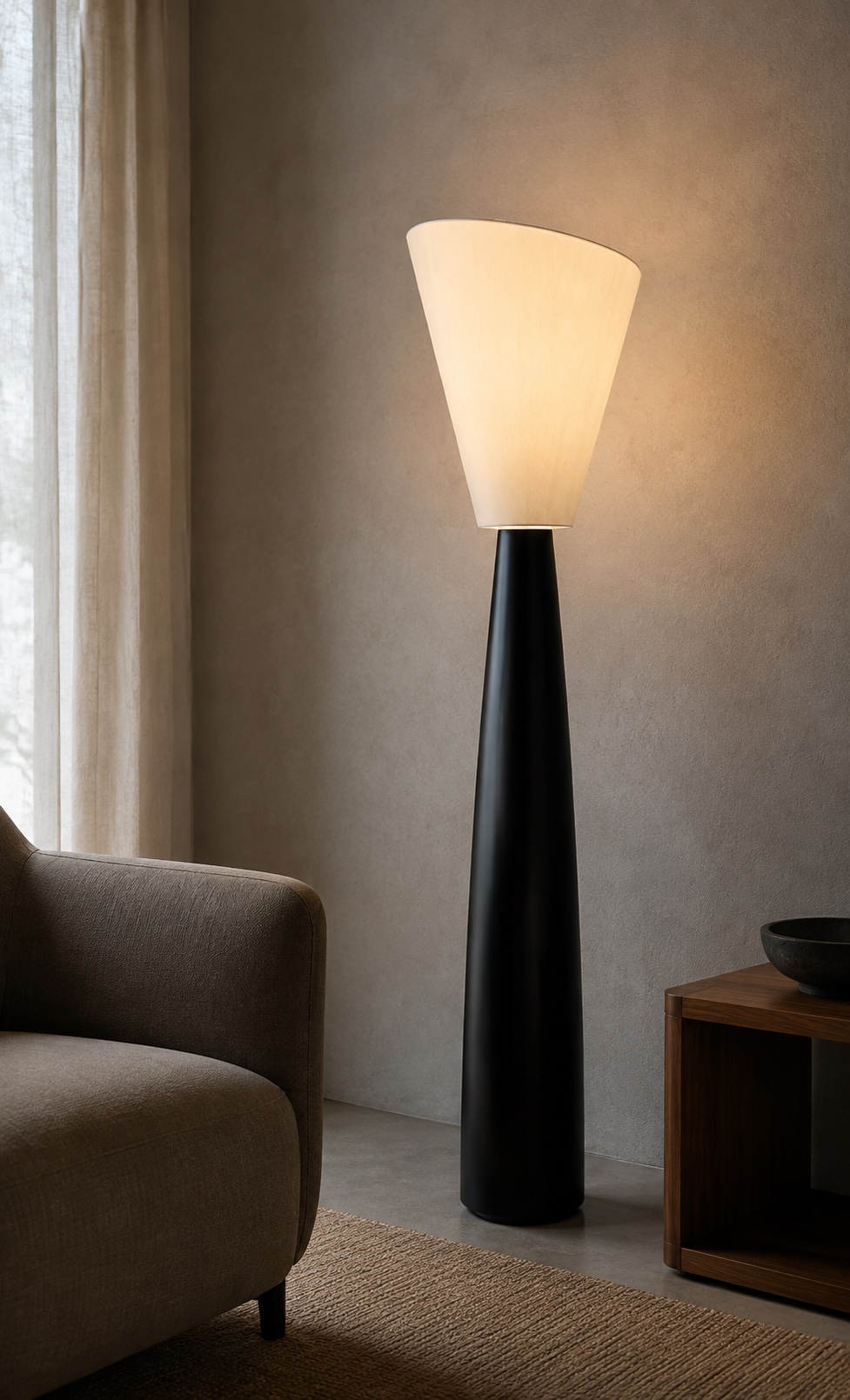 Lounge visualisation featuring a tall black floor light with a softly illuminated flared shade