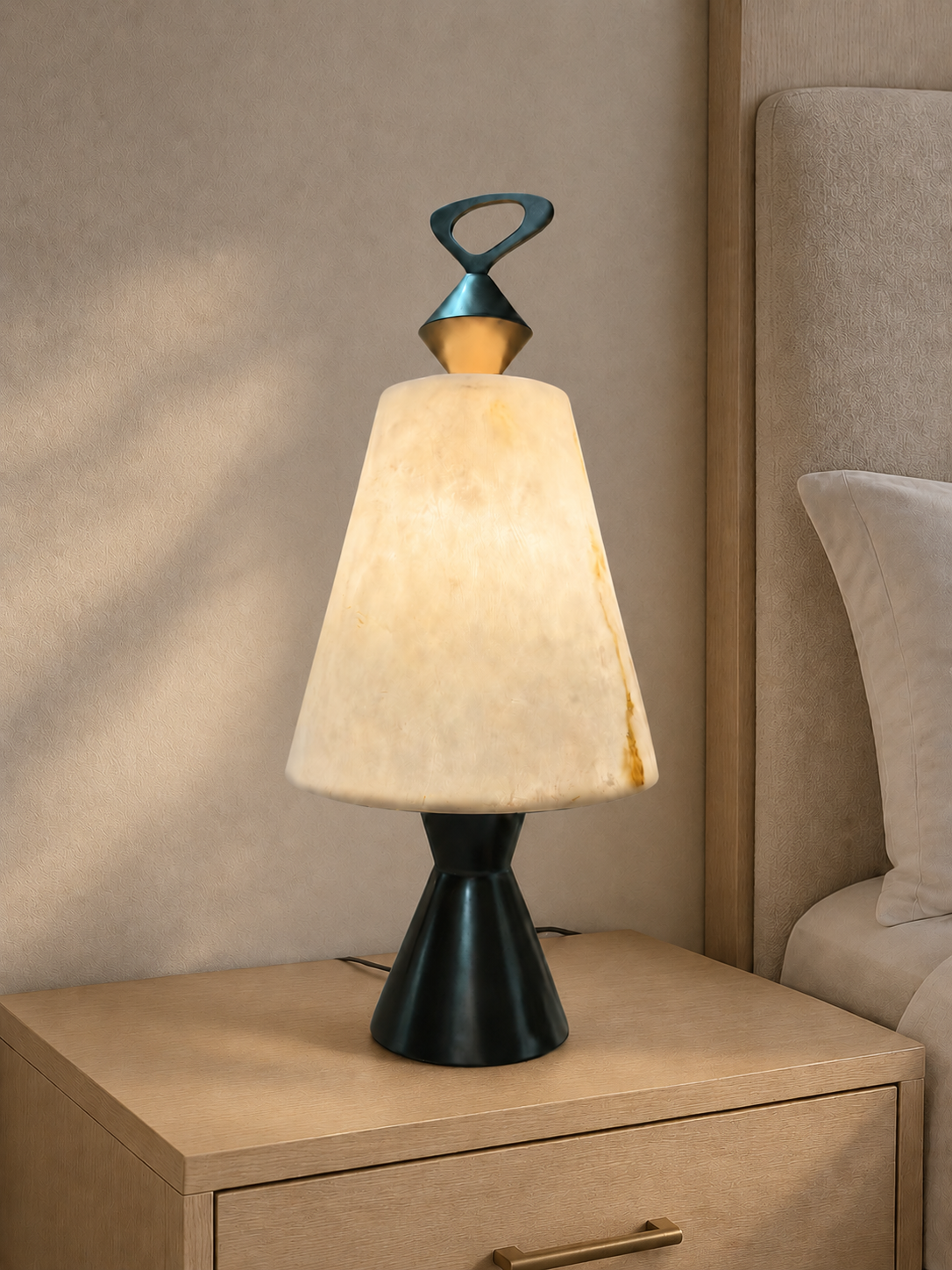 Interior visualisation featuring a table light with a textured translucent shade, loop finial and dark tapered base