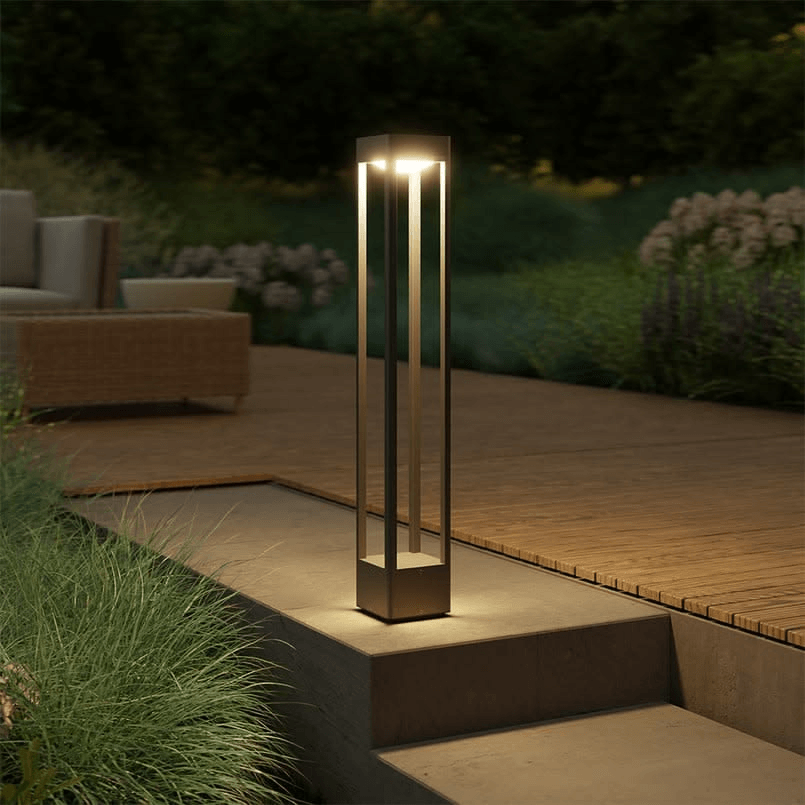 Custom open-frame architectural bollard light installed on limestone terrace steps.