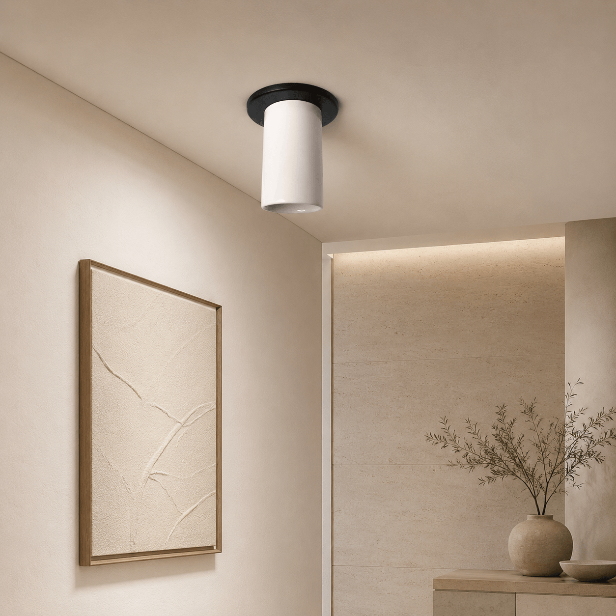 Custom white cylindrical ceiling light with black ceiling canopy.