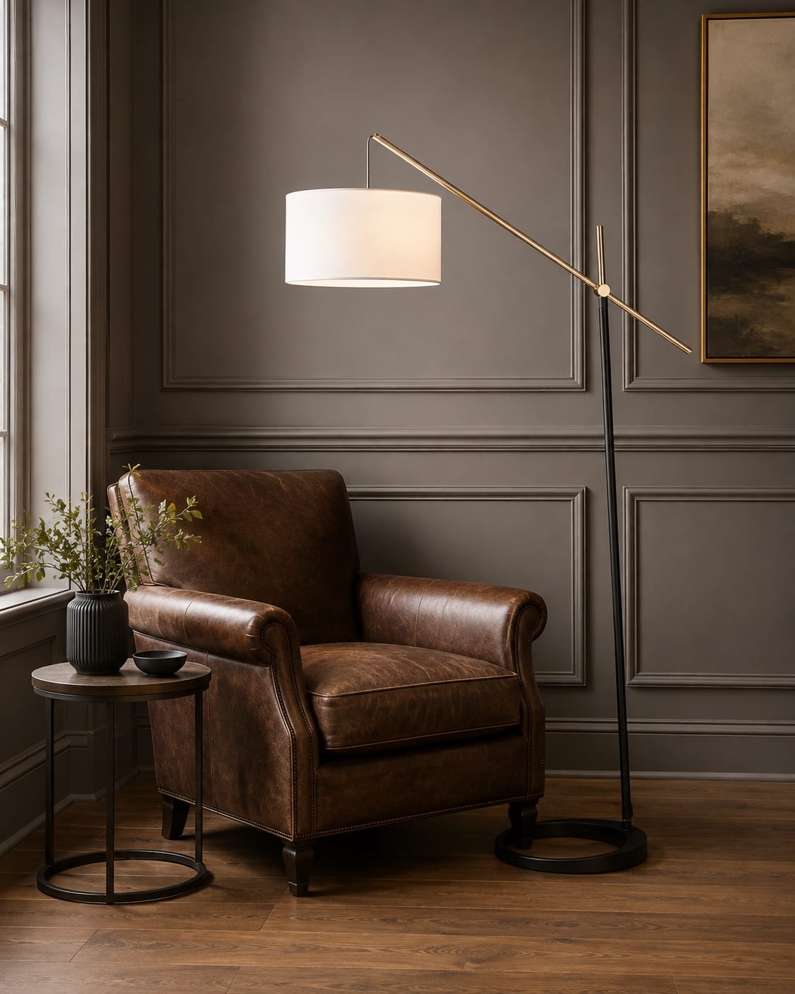 Custom adjustable balance floor lamp with a slender black and brass frame and suspended fabric shade