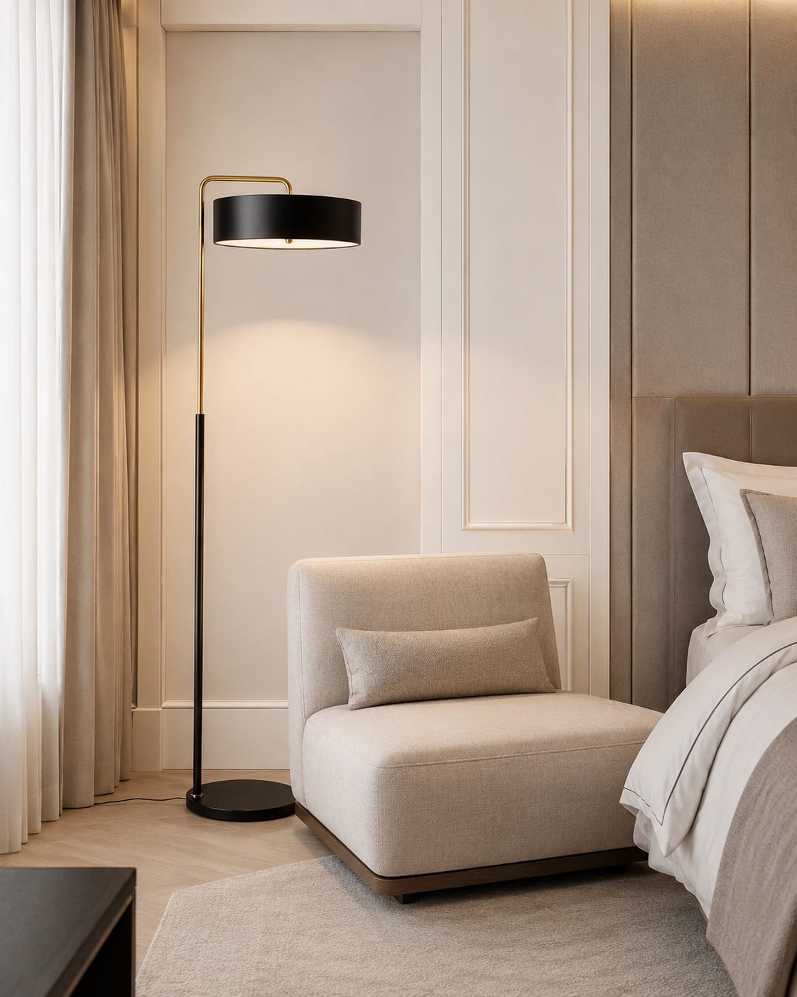Custom minimal floor lamp with a slim brass-toned frame and dark drum fabric shade