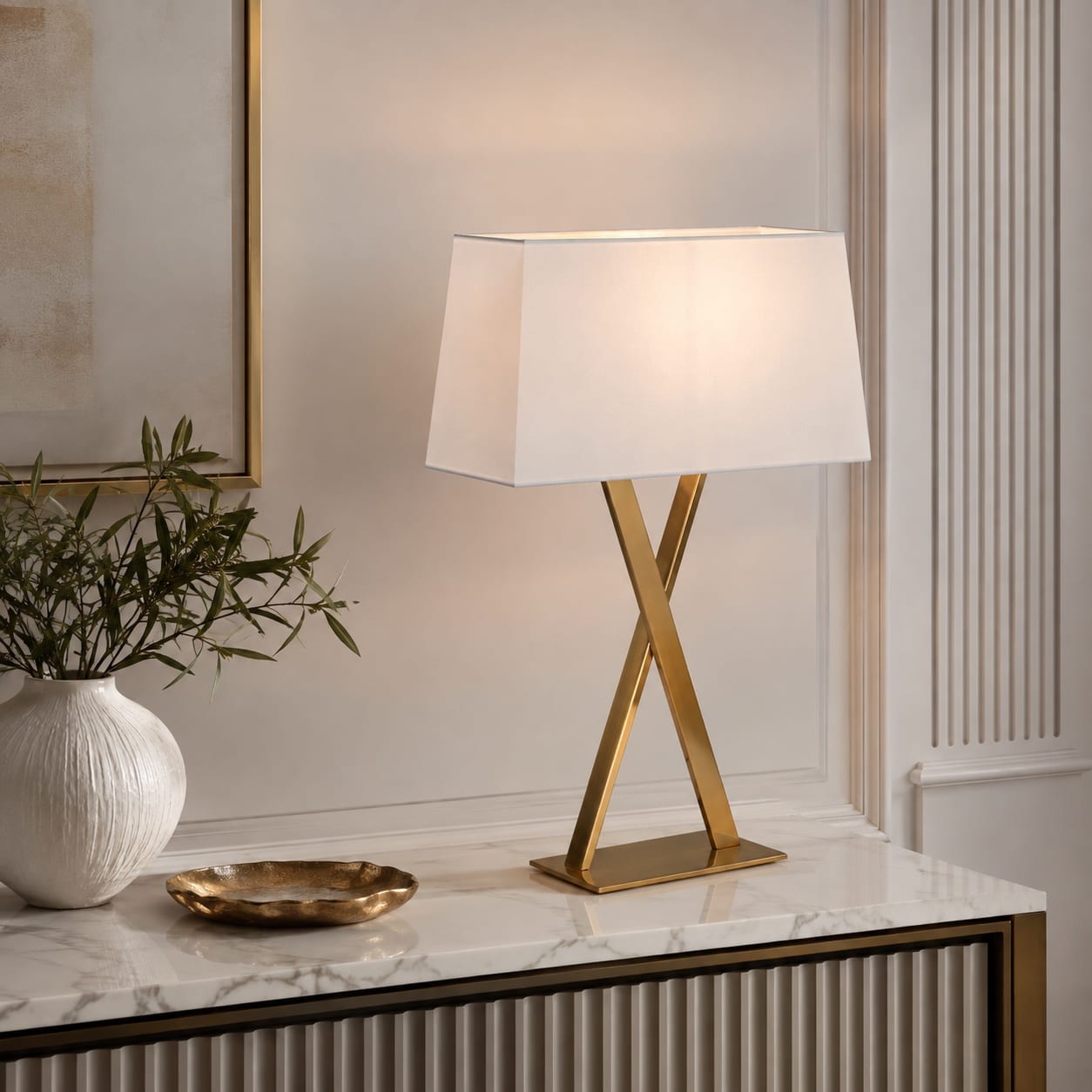 Custom brass X-frame table lamp with a tailored white rectangular fabric shade