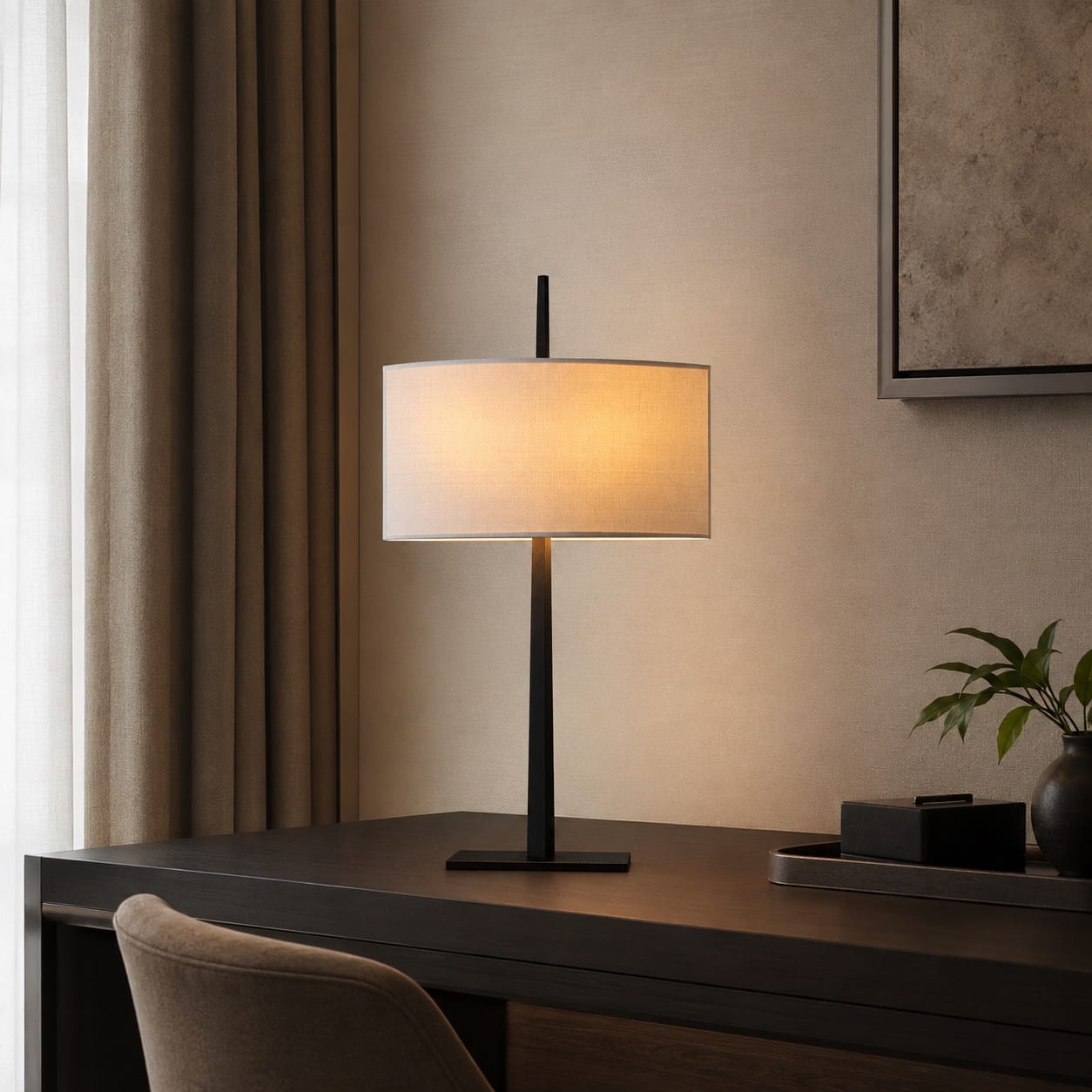 Custom minimal black-stem table lamp with an illuminated white rectangular fabric shade on a dark desk